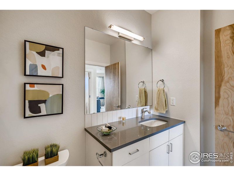 Secondary Full Bathroom. Photos are of the model home.