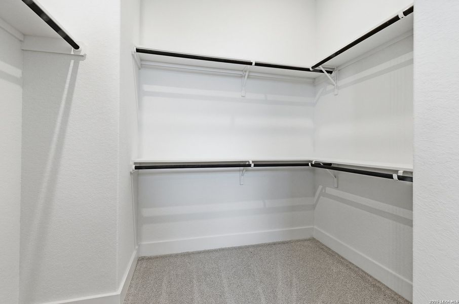 Spacious, unfurnished interior of a new home in Centero at Stone Oak, San Antonio (Image 17).