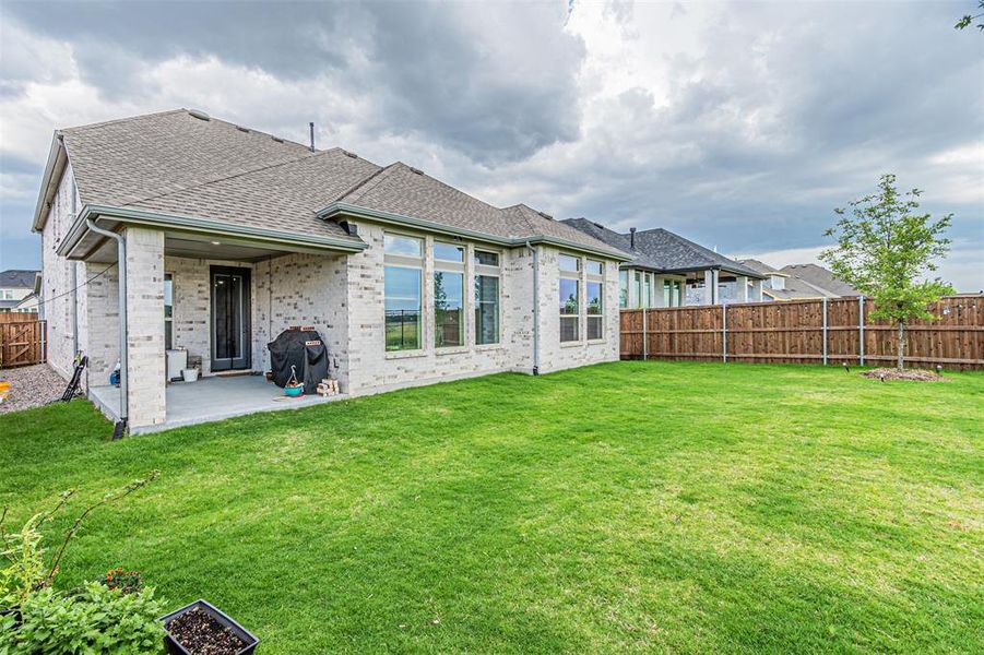 Exterior details and patio area of a home in , Aubrey (Image 27).