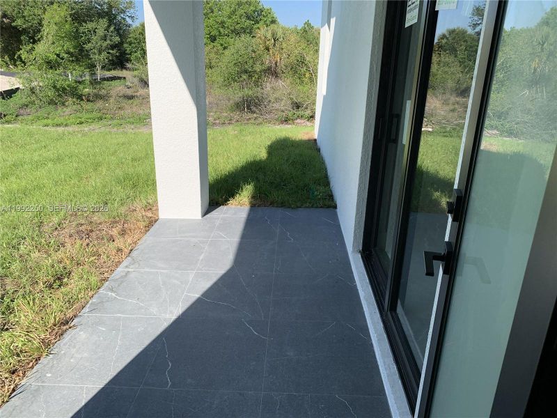 Exterior details and patio area of a home in , Lehigh Acres (Image 3).