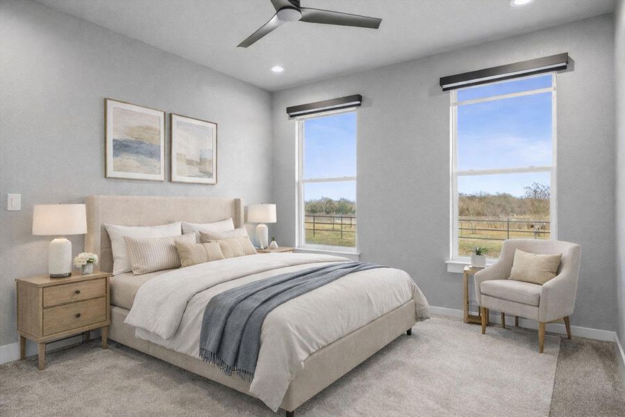 Bedroom with a ceiling fan, carpet flooring, and recessed lighting - digitally staged.