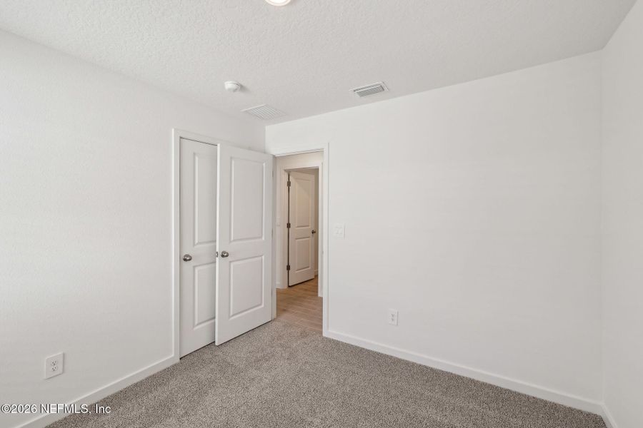 Spacious, unfurnished interior of a new home in Flagler Village - Classic Series, Palm Coast (Image 17). Spacious, unfurnished interior of a new home in Flagler Village - Classic Series, Palm Coast (Image 17).