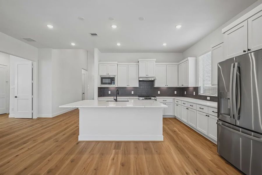 Representative furnished interior of a home built from the Lynnbrook by Chesmar Homes in Wood Leaf Reserve, Tomball (Image 7). Representative furnished interior of a home built from the Lynnbrook by Chesmar Homes in Wood Leaf Reserve, Tomball (Image 7).