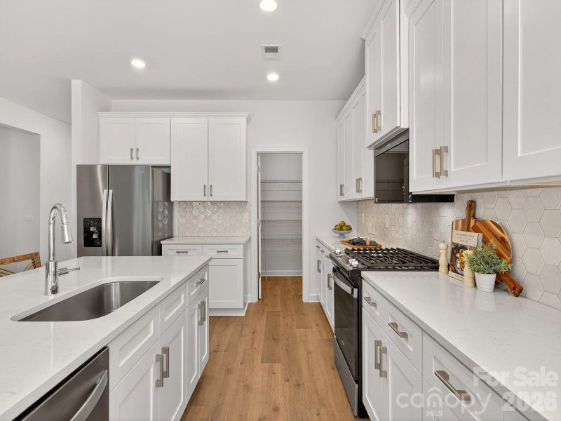 Photo is not of the actual home, but is an inspirational photo of builder’s model home and may depict options, furnishings, and/or decorator features that are not included