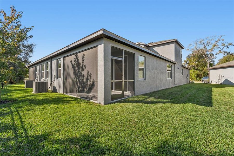 Exterior details and patio area of a home in Villas Del Lago, Lutz (Image 36).