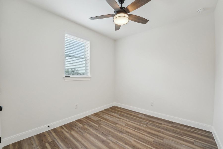 Bedroom 2 with luxury vinyl floor Bedroom 2 with luxury vinyl floor