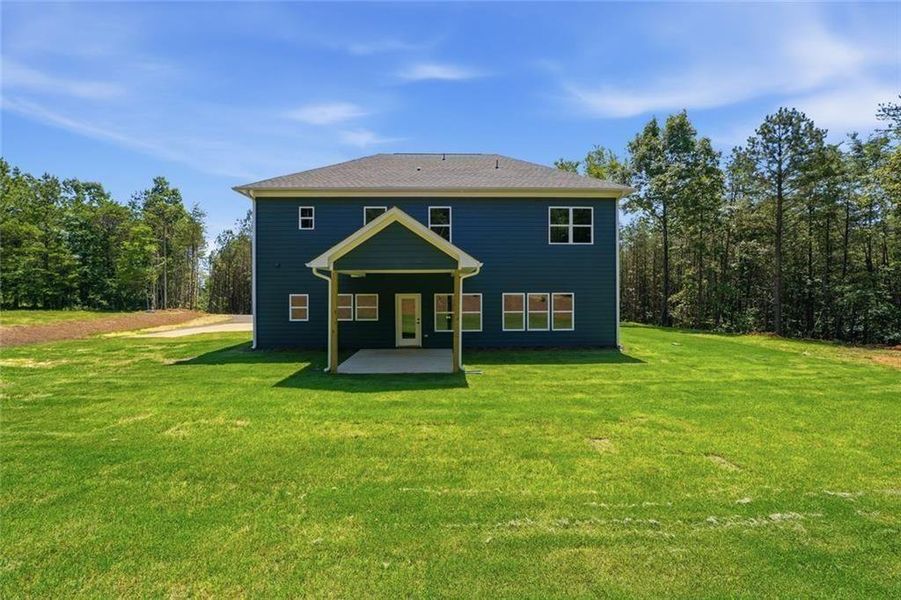 Exterior details and patio area of a home in , White (Image 26).