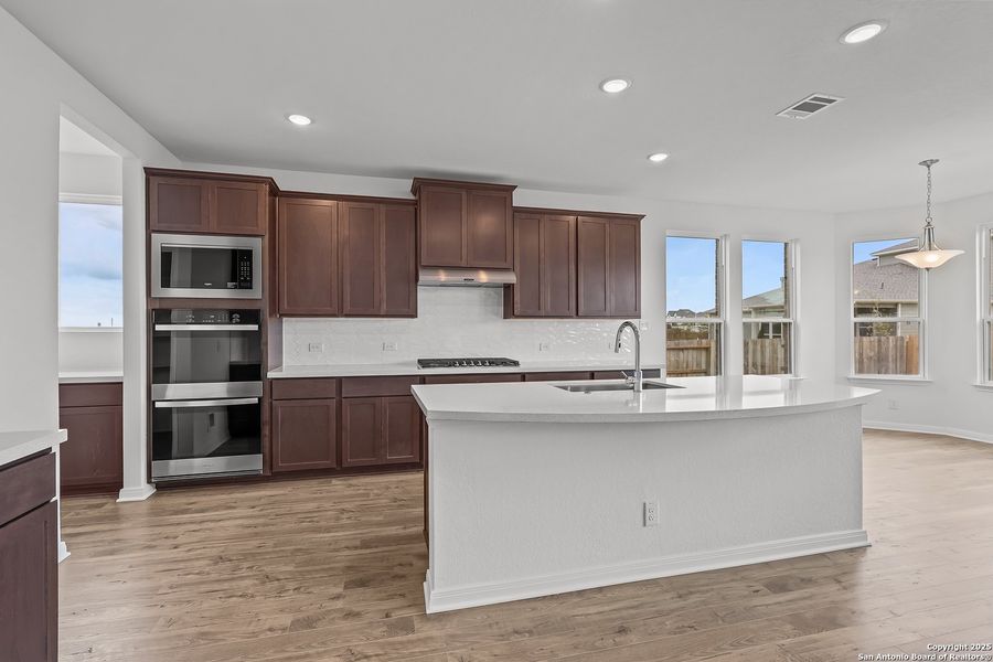 Furnished interior view inside a new home in Homestead 75', Schertz (Image 16).