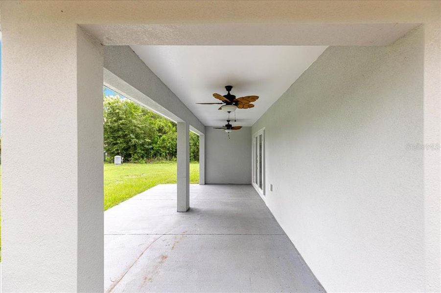 Exterior details and patio area of a home in , Summerfield (Image 24).