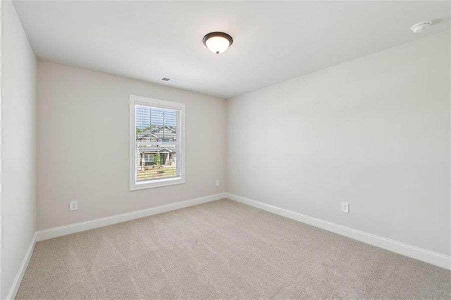 Spacious, unfurnished interior of a new home in Vines at Mill Creek - Estate Series, Braselton (Image 50).