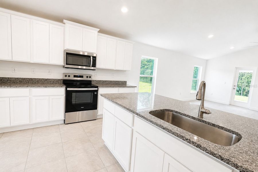 Furnished interior view inside a new home in Harmony Central, St. Cloud (Image 8).