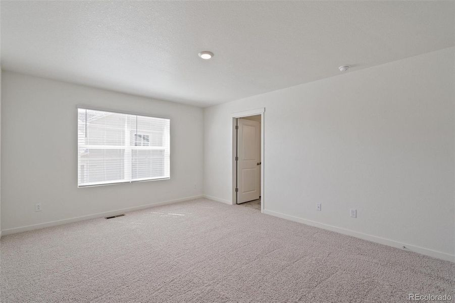 Spacious, unfurnished interior of a new home in Trails at Crowfoot, Parker (Image 23).