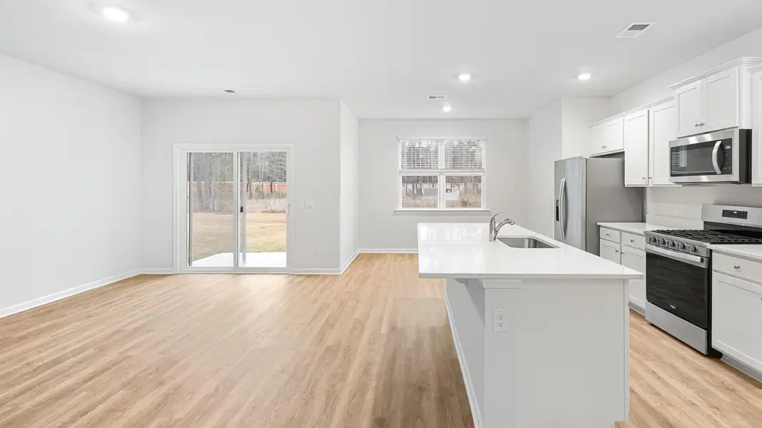 Furnished interior view inside a new home in Pine Hills at Cane Bay, Summerville (Image 2).