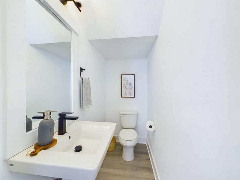 MOVE-IN READY! the powder room is conveniently located on the first floor. FINISHES & FLOOR PLANS WILL VARY!