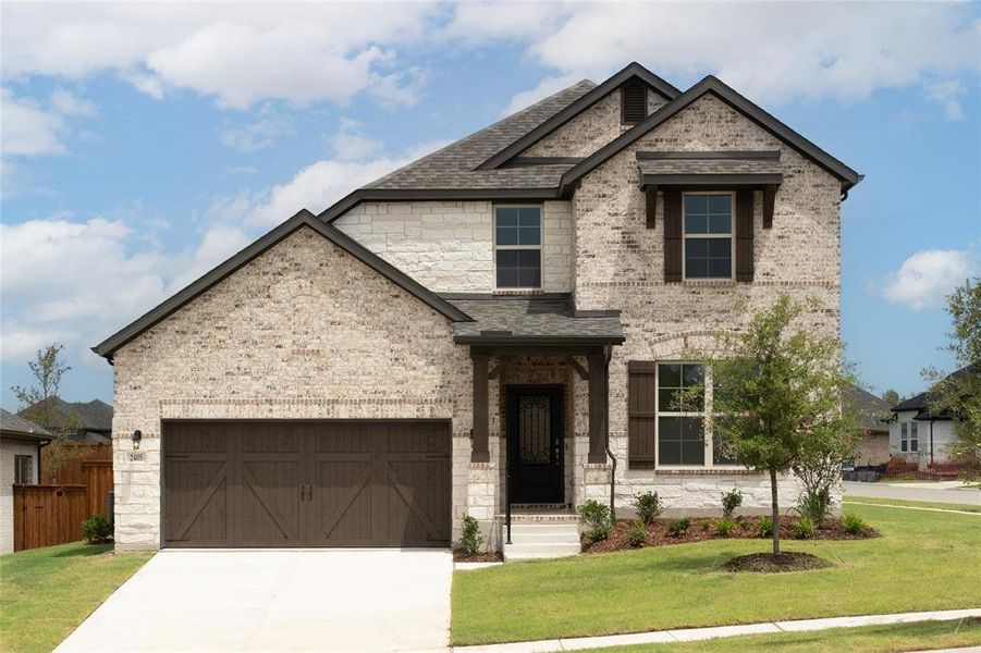 Front exterior of a new home in Enclave at Legacy Hills: Crossings 50', Celina, TX, highlighting curb appeal (Image 1).
