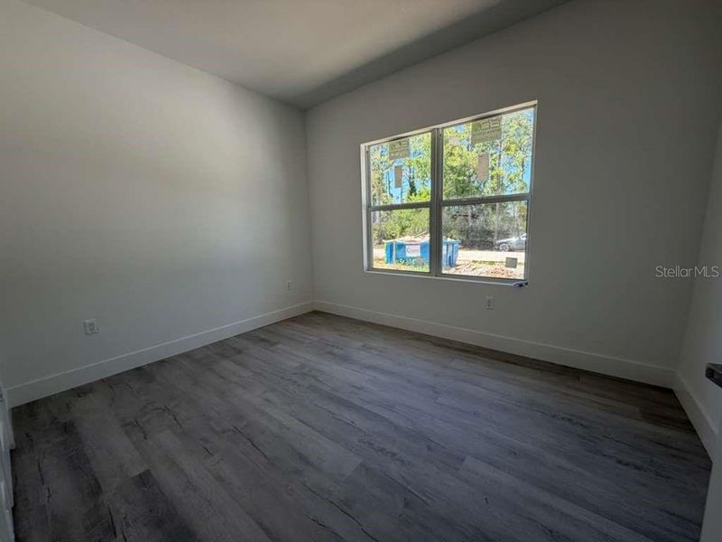 Spacious, unfurnished interior of a new home in , Port Charlotte (Image 13).