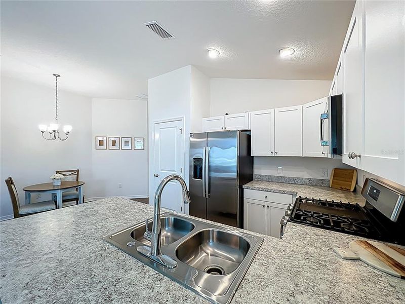 Furnished interior view inside a new home in , The Villages (Image 8).