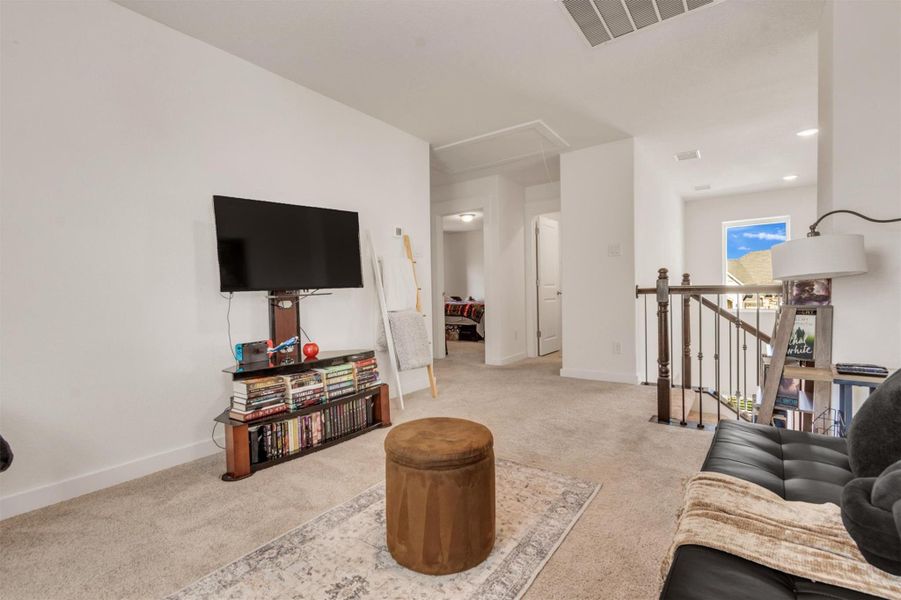 Furnished interior view inside a new home in Crosswinds, Kyle (Image 23).