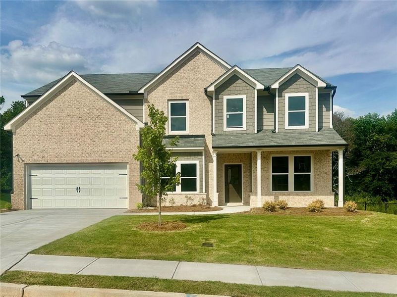 Front exterior of a new home in , Auburn, GA, highlighting curb appeal (Image 1). Front exterior of a new home in , Auburn, GA, highlighting curb appeal (Image 1).