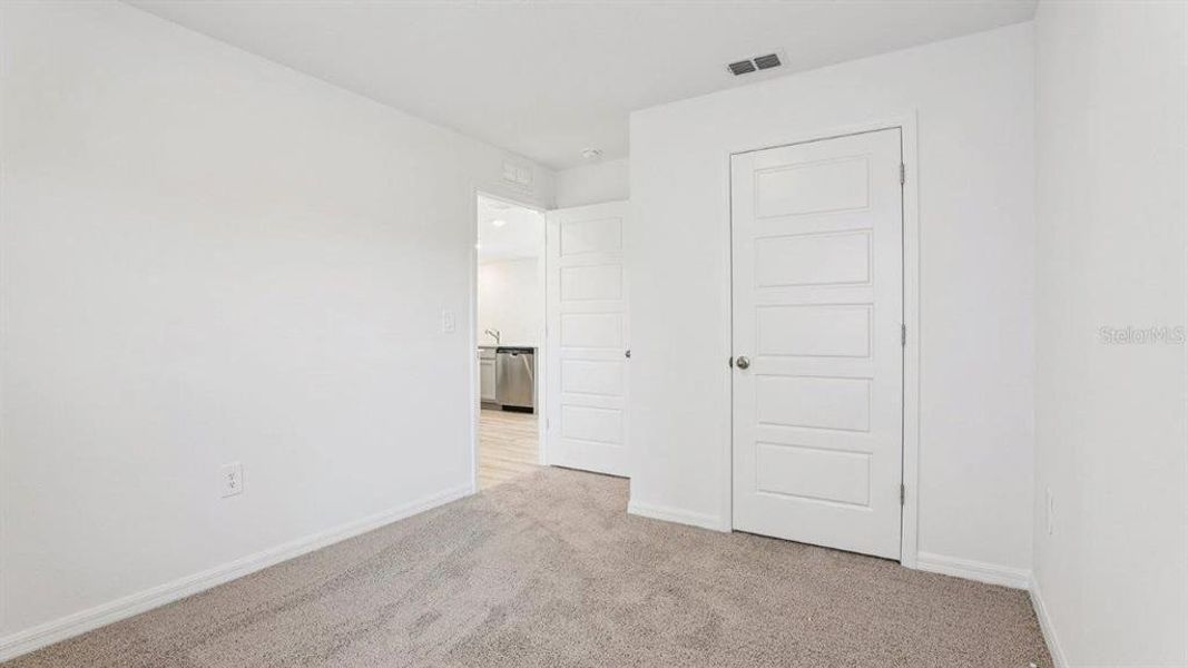 Spacious, unfurnished interior of a new home in Villamar, Winter Haven (Image 21).