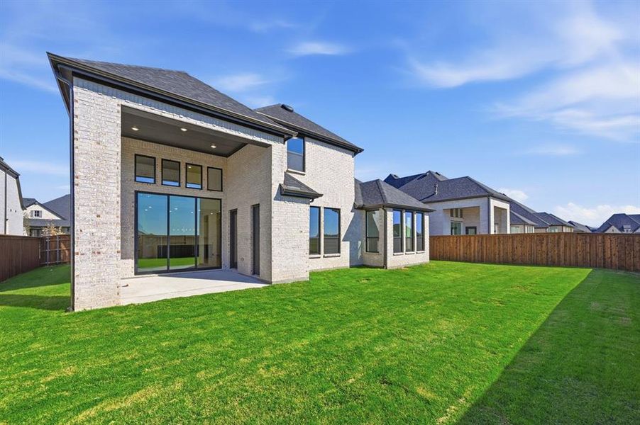 Exterior details and patio area of a home in Quail Hollow: 72ft. lots, Rockwall (Image 17).