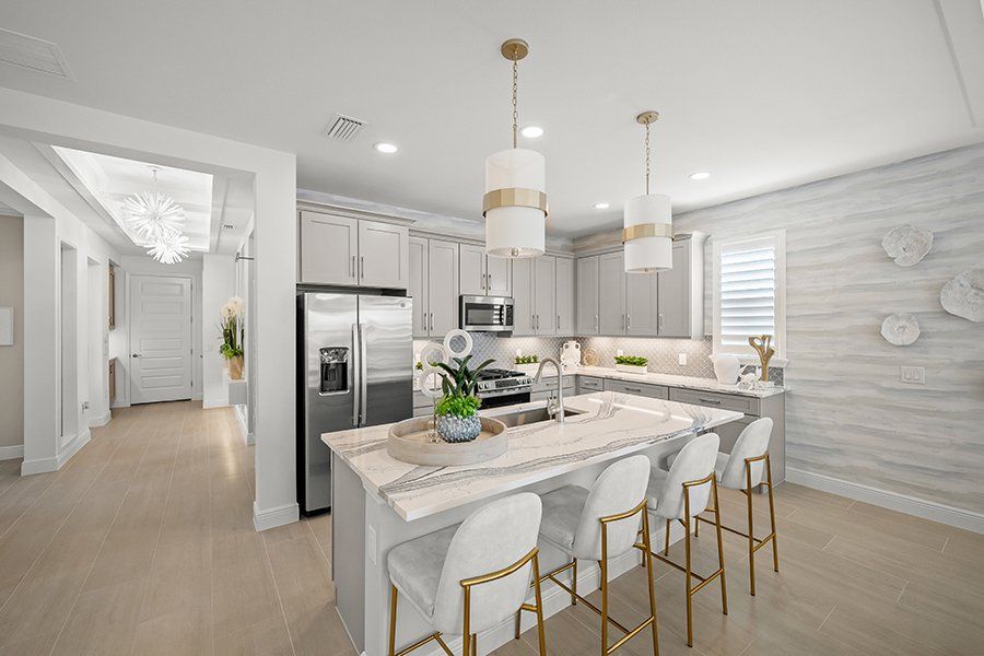 Representative furnished interior of a home built from the Mooring by Homes by Towne in Shellstone at Waterside, Sarasota (Image 9). Representative furnished interior of a home built from the Mooring by Homes by Towne in Shellstone at Waterside, Sarasota (Image 9).