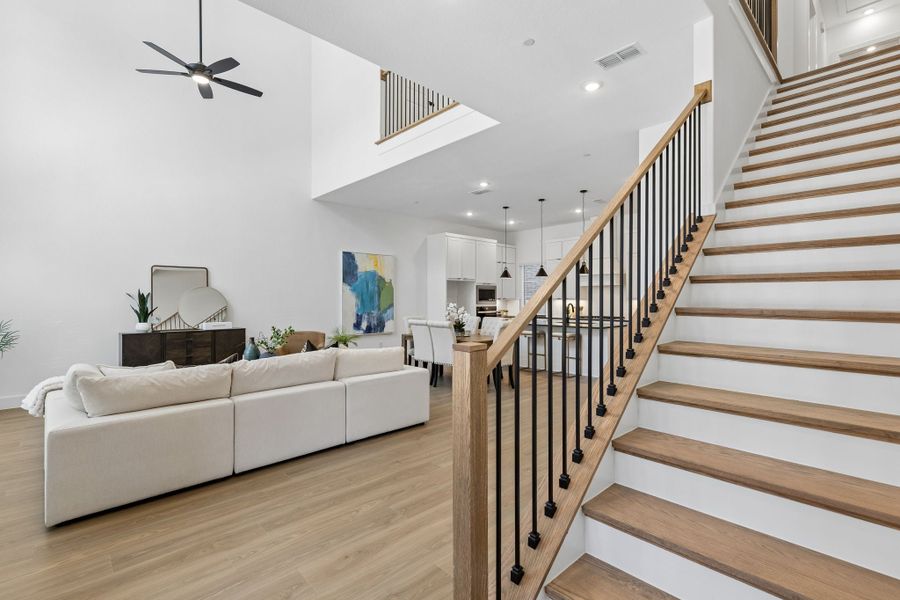 Representative furnished interior of a home built from the Roosevelt by Centre Living Homes in Newman Village Townhomes, Frisco (Image 15).