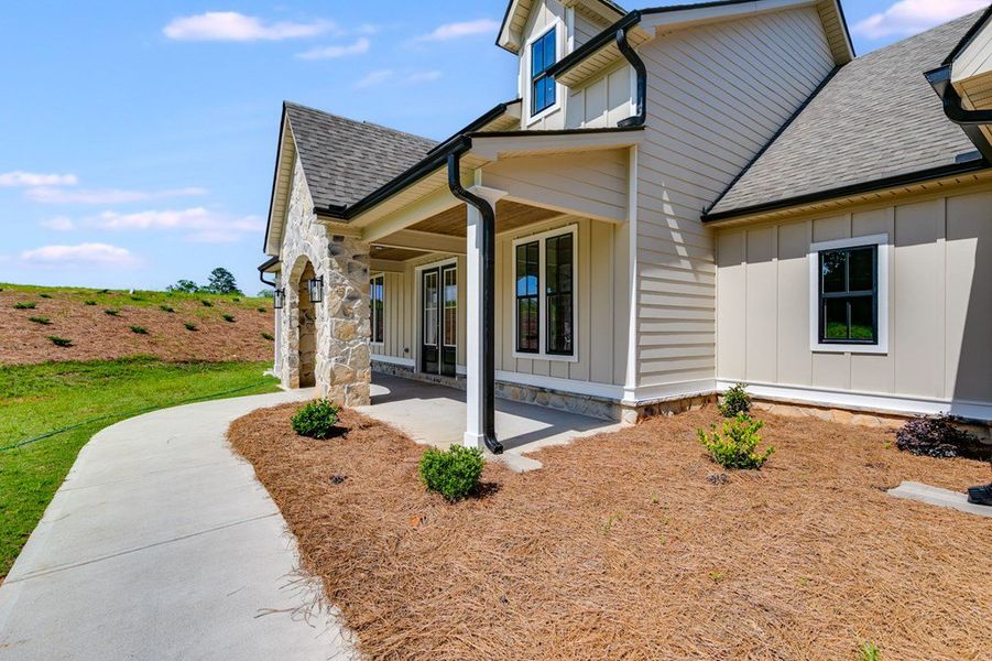 Exterior details and patio area of a home in Harmon Springs, Carrollton (Image 3).