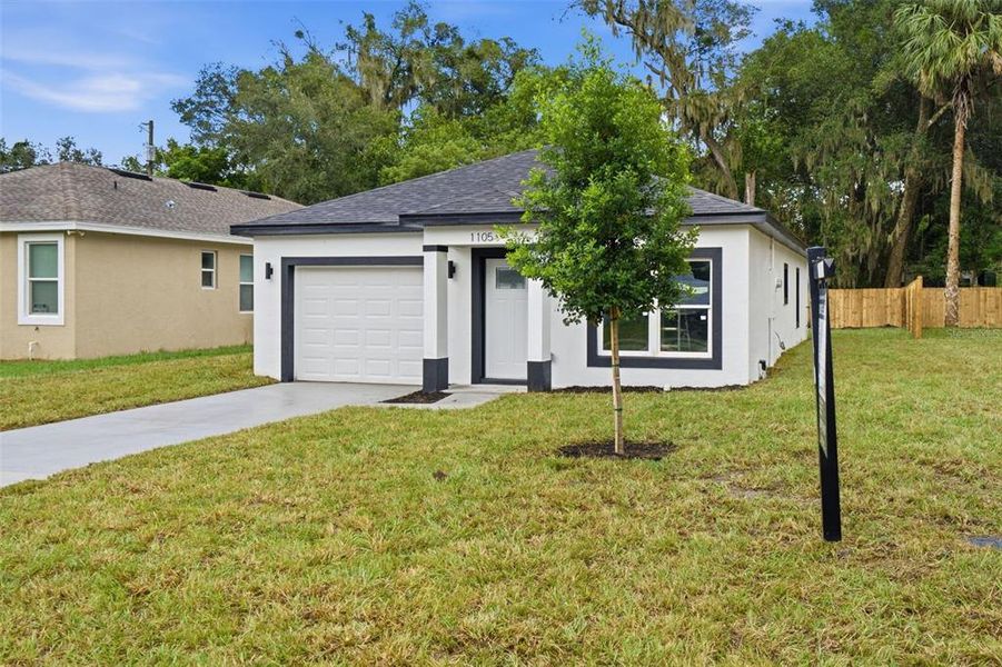Front exterior of a new home in , Deland, FL, highlighting curb appeal (Image 19).