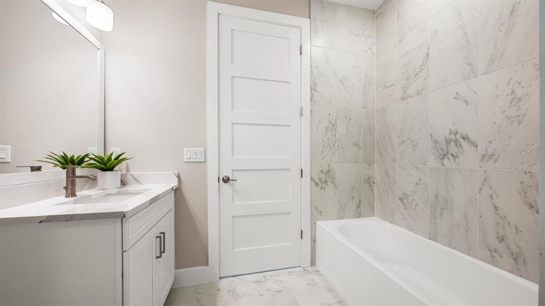 Furnished interior view inside a new home in Esplanade at Azario Lakewood Ranch, Lakewood Ranch (Image 41).