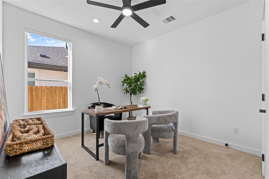Home office with light colored carpet, ceiling fan, and recessed lighting Home office with light colored carpet, ceiling fan, and recessed lighting