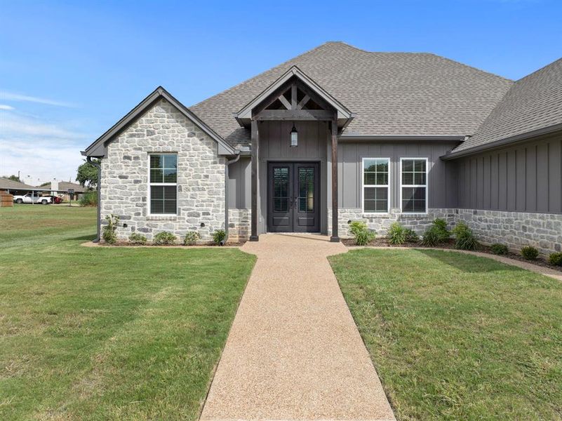 Front exterior of a new home in , Robinson, TX, highlighting curb appeal (Image 22). Front exterior of a new home in , Robinson, TX, highlighting curb appeal (Image 22).