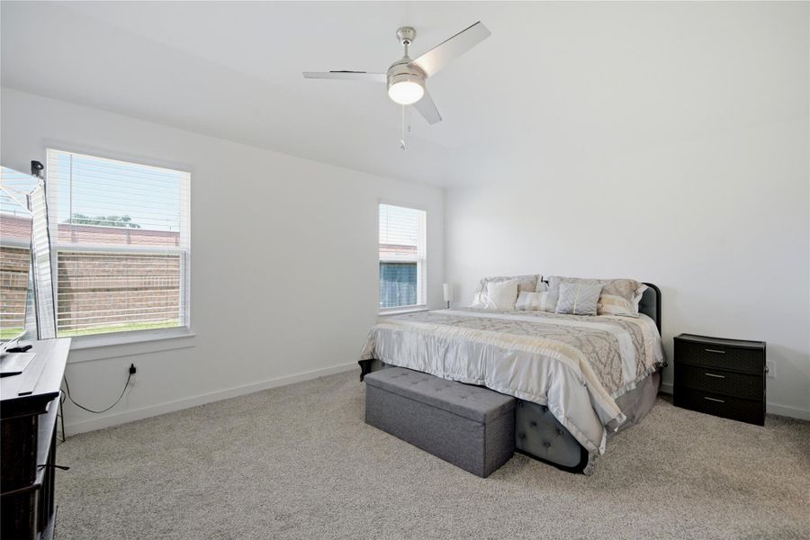 Check out this spacious primary bedroom!
