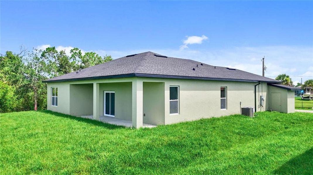 Front exterior of a new home in , Port Charlotte, FL, highlighting curb appeal (Image 22).