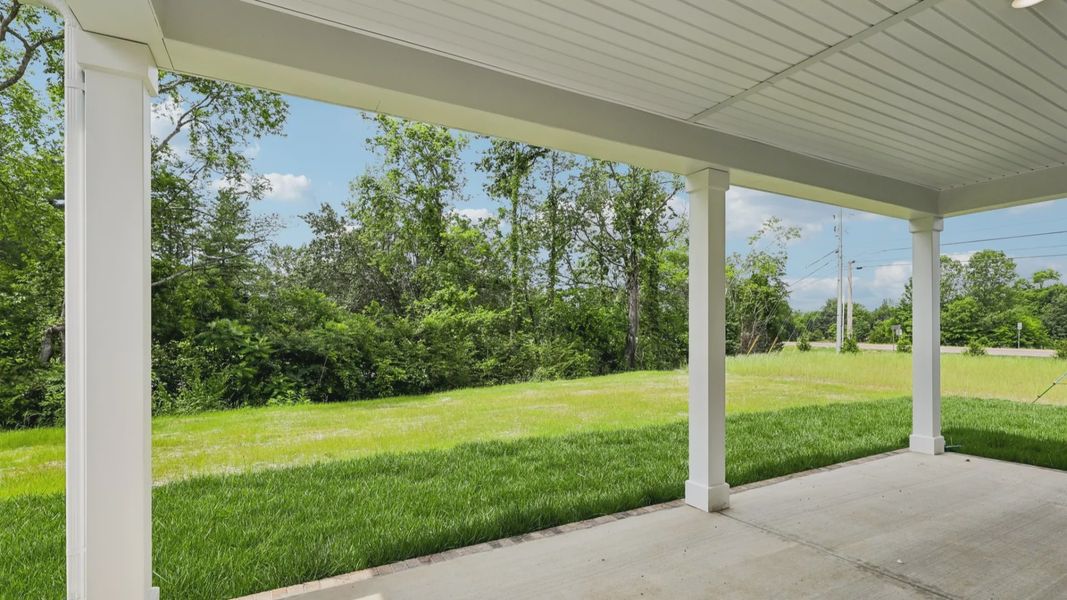 Covered Porch and Backyard