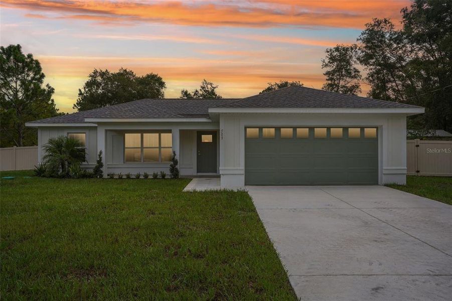 Front exterior of a new home in , Citrus Springs, FL, highlighting curb appeal (Image 27).