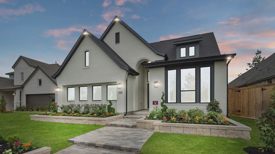 Representative exterior photo of a completed home built from the Hampton by Chesmar Homes in Wildrye 60', Waller, TX (Image 25).
