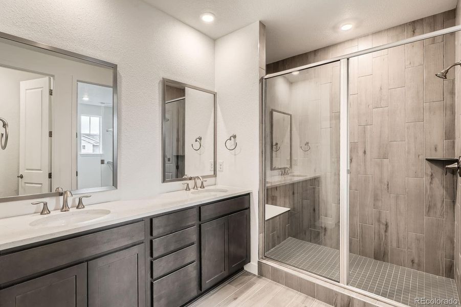 Furnished interior view inside a new home in Sunset Village: The Grand Collection, Erie (Image 5). Furnished interior view inside a new home in Sunset Village: The Grand Collection, Erie (Image 5).