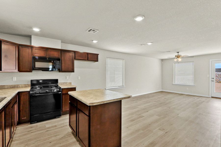 Furnished interior view inside a new home in Rancho Desierto Bello, Horizon City (Image 9).