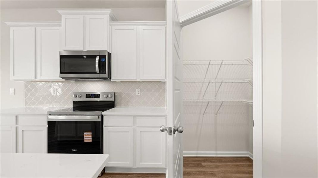Furnished interior view inside a new home in The Preserve at Agricultural Village, Perry (Image 8).
