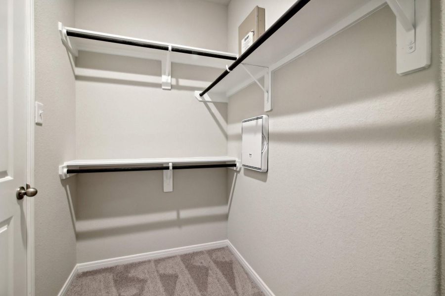 This walk-in closet is perfect for organization.