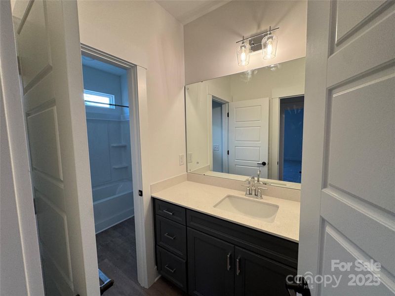 Upstairs bath in secondary bedroom