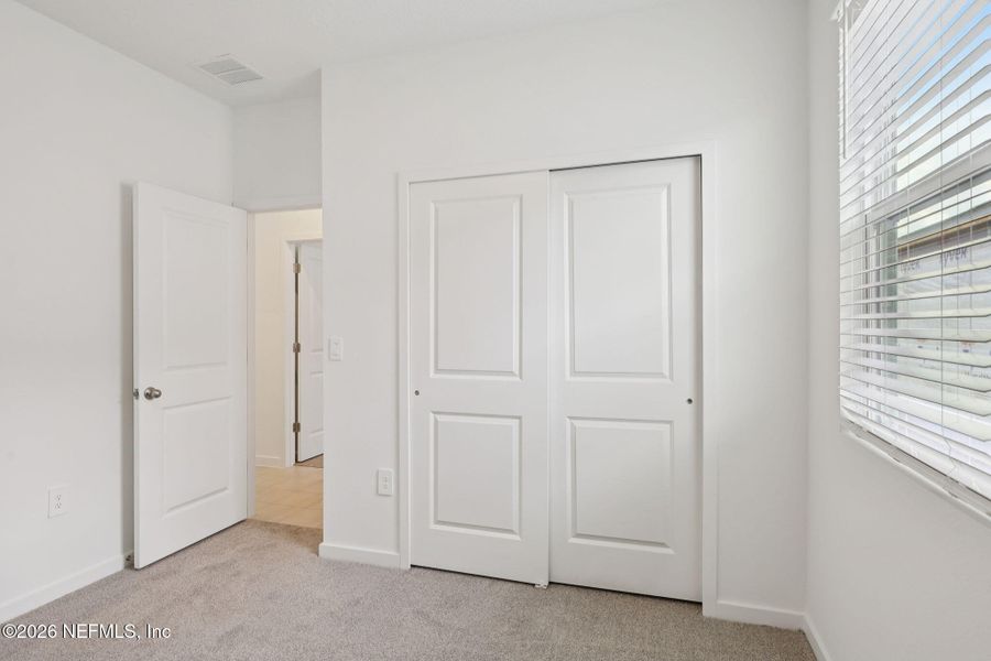 Spacious, unfurnished interior of a new home in Cypress Meadows - Signature Series, Jacksonville (Image 24).