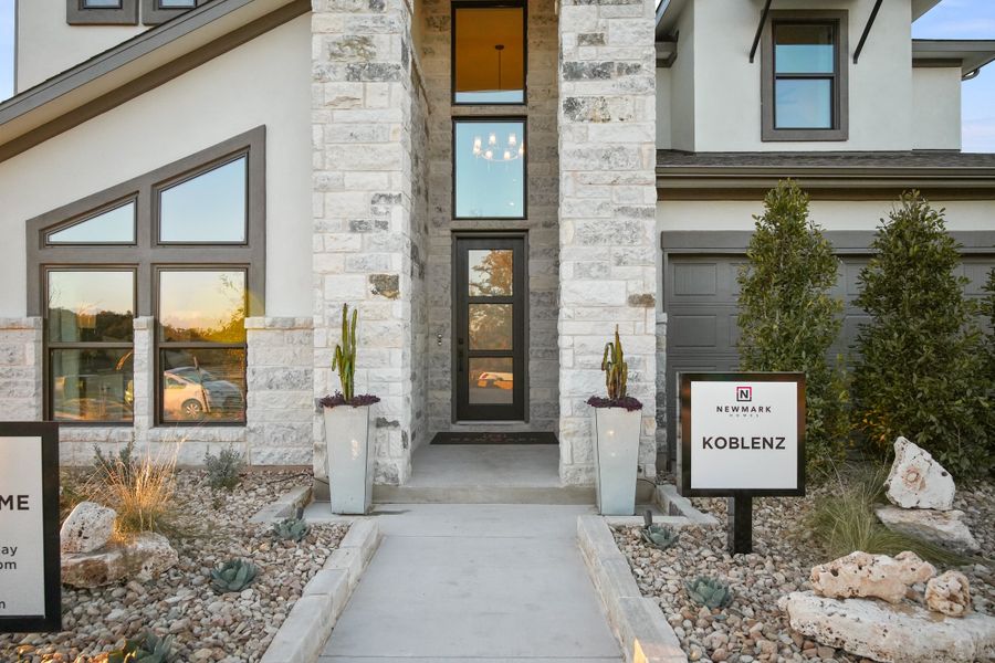 Exterior details and patio area of a home in Provence 50', Austin (Image 3).