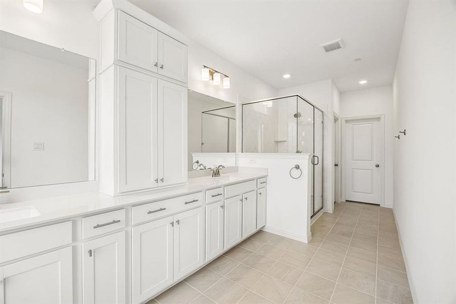 Your new owner's suite comes complete with fantastic storage space, an oversized walk in shower and dream closets!