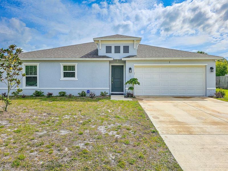 Front exterior of a new home in , Palm Coast, FL, highlighting curb appeal (Image 19).