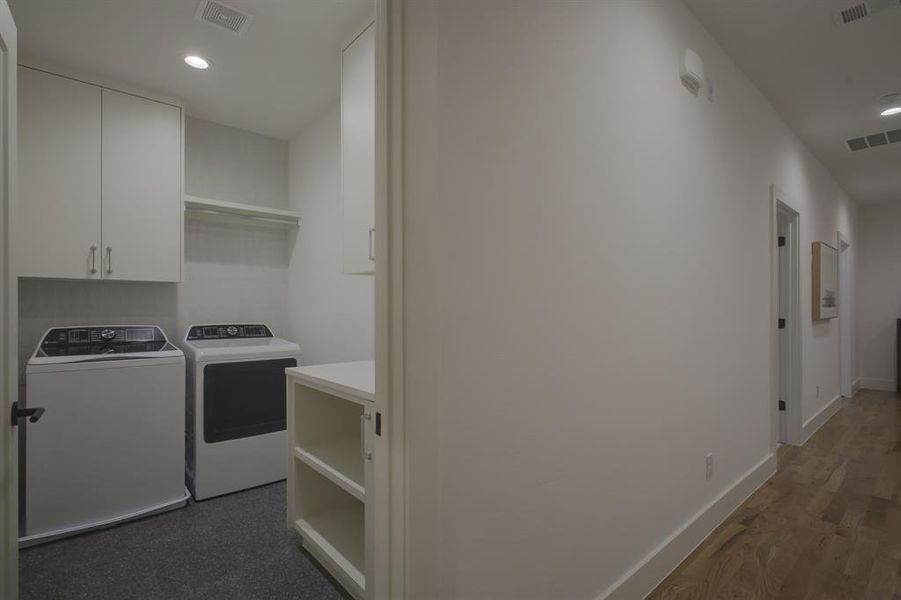 Clothes washing area with separate washer and dryer