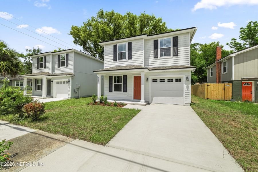 Front exterior of a new home in , Jacksonville, FL, highlighting curb appeal (Image 21).