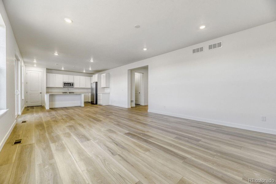 Spacious, unfurnished interior of a new home in Newlin Crossing, Parker (Image 15).