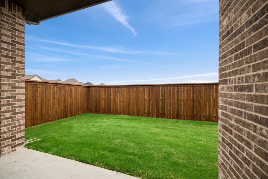Exterior details and patio area of a home in Creekshaw – Gardens, Royse City (Image 3). Exterior details and patio area of a home in Creekshaw – Gardens, Royse City (Image 3).